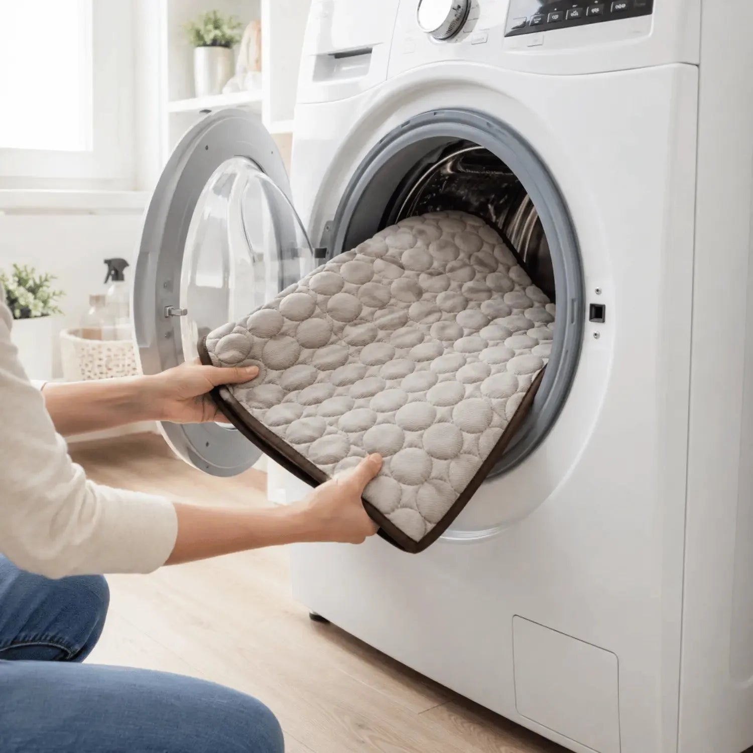 Cooling mat being placed in a washing machine